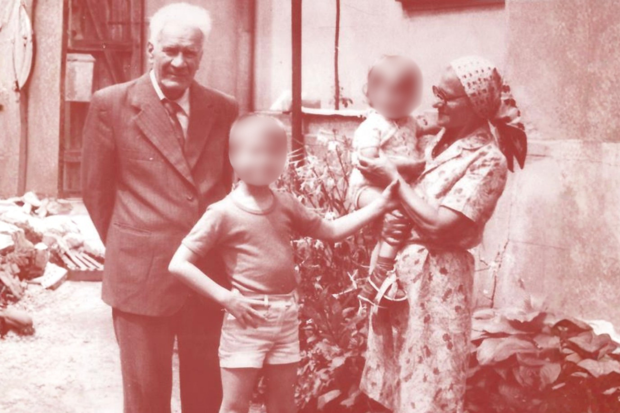 An archival photograph of the family, faces withheld